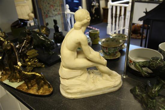 A late 19th / early 20th century carved alabaster model of a seated female nude, 20in.